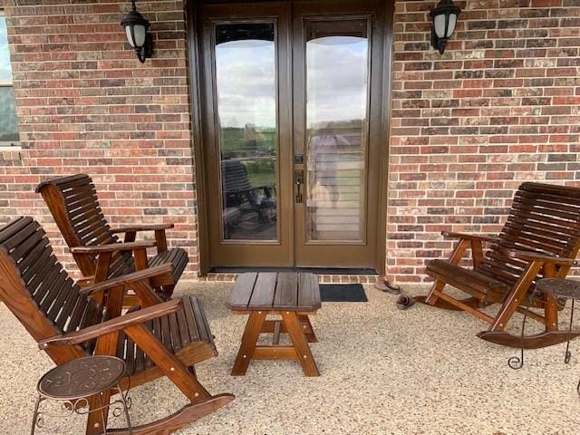 doorway to property featuring french doors