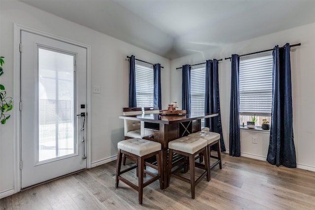 dining area featuring light wood-type flooring