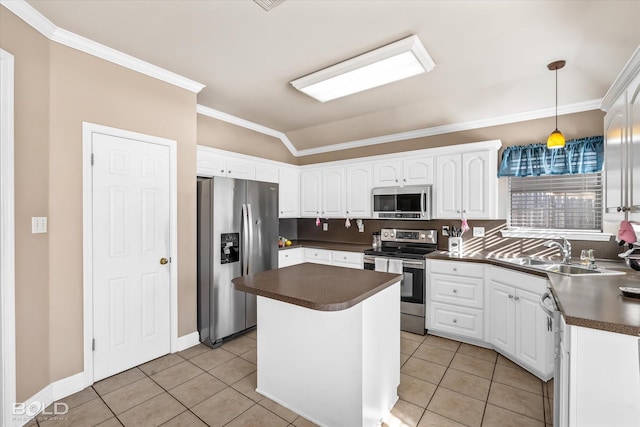 kitchen featuring stainless steel appliances, sink, decorative light fixtures, white cabinets, and light tile patterned flooring