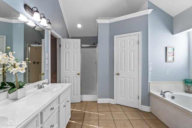 bathroom with tile patterned flooring, separate shower and tub, a chandelier, lofted ceiling, and vanity