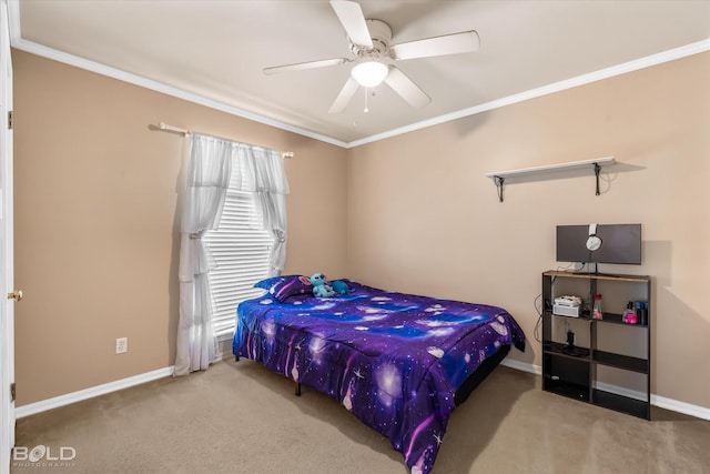 carpeted bedroom featuring ceiling fan and crown molding