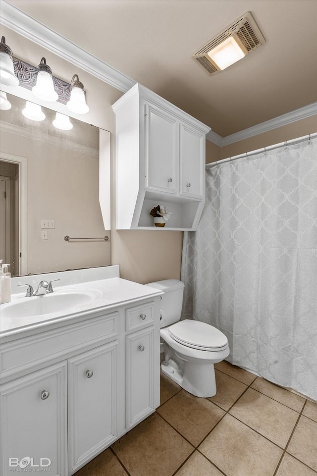 bathroom featuring toilet, vanity, tile patterned floors, and ornamental molding