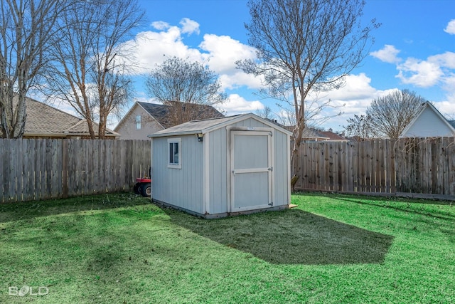 view of outbuilding featuring a lawn