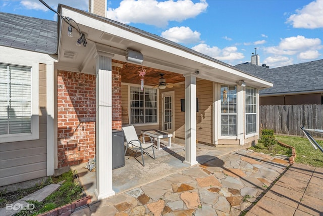 view of patio featuring ceiling fan