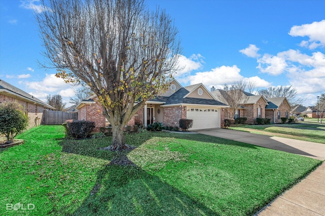 view of front of house featuring a garage and a front yard