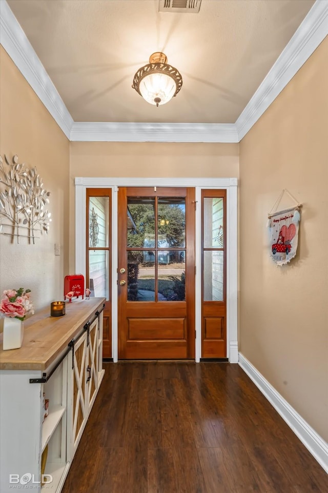 interior space with ornamental molding and dark wood-type flooring