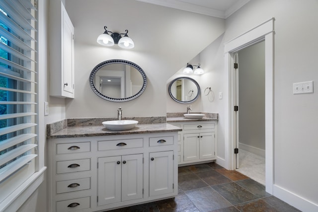 bathroom with vanity, radiator heating unit, and crown molding