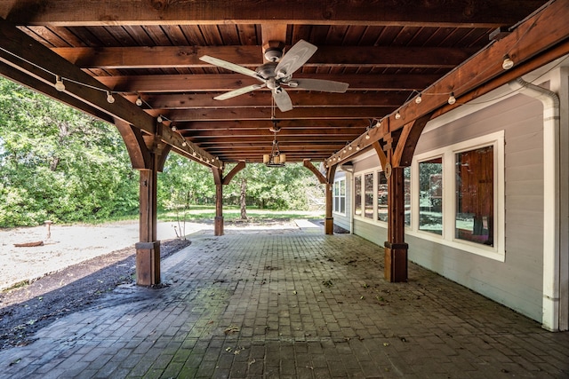 view of patio featuring ceiling fan