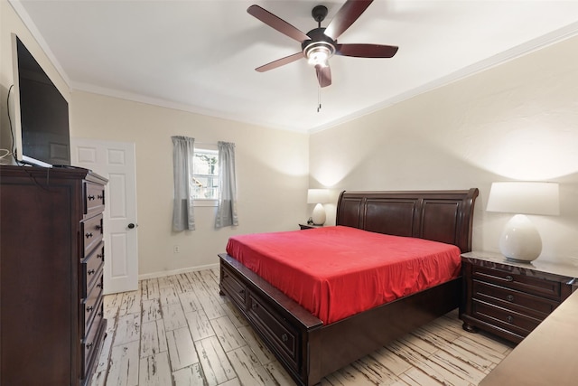 bedroom with light hardwood / wood-style flooring, ceiling fan, and ornamental molding