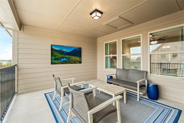 view of patio / terrace featuring a balcony and an outdoor living space