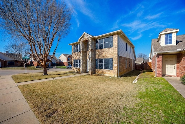 view of front facade with a front lawn