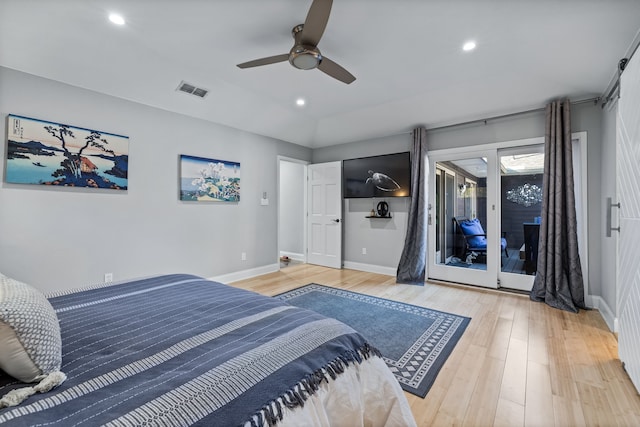 bedroom featuring access to exterior, ceiling fan, and wood-type flooring