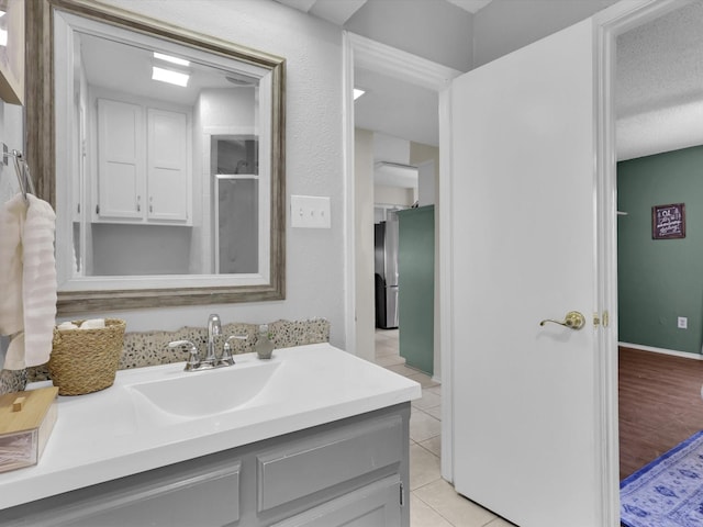 bathroom featuring vanity and tile patterned floors