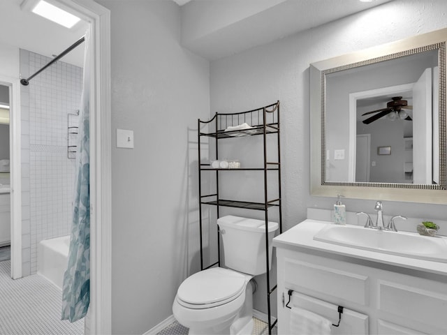 full bathroom with vanity, shower / bathtub combination with curtain, ceiling fan, and toilet