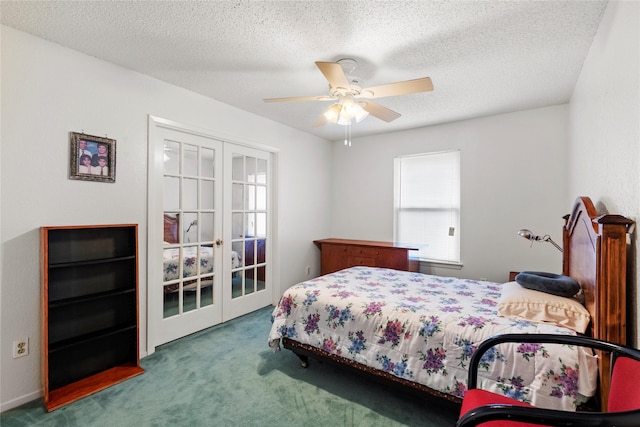 bedroom featuring ceiling fan, french doors, carpet, and a textured ceiling