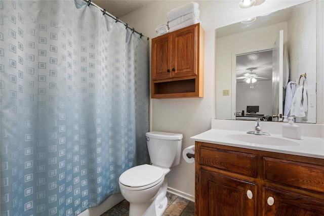 bathroom with ceiling fan, tile patterned floors, a textured ceiling, toilet, and vanity