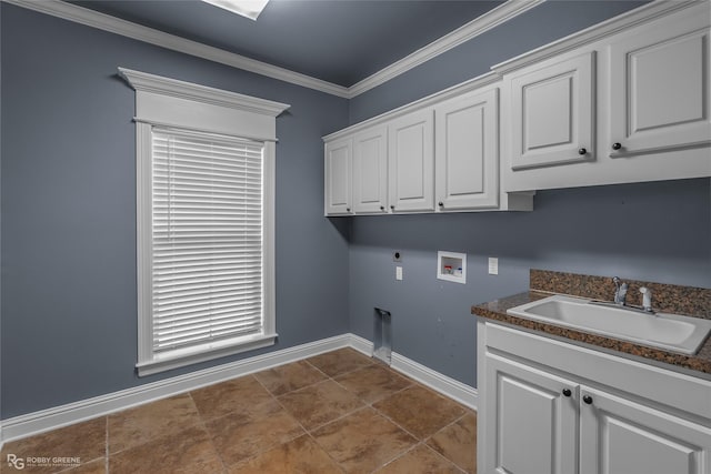 washroom with sink, cabinets, washer hookup, hookup for an electric dryer, and ornamental molding