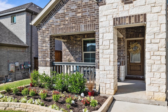 doorway to property featuring a porch