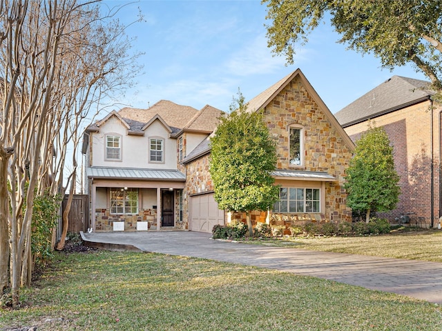 front facade with a front lawn and a garage