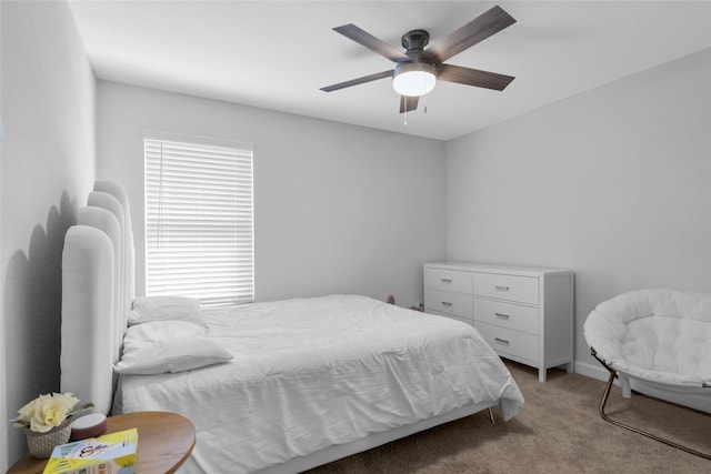 bedroom with ceiling fan and light carpet