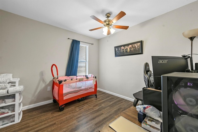 bedroom featuring ceiling fan and dark hardwood / wood-style flooring