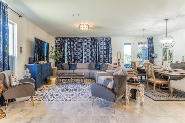 living room featuring an inviting chandelier