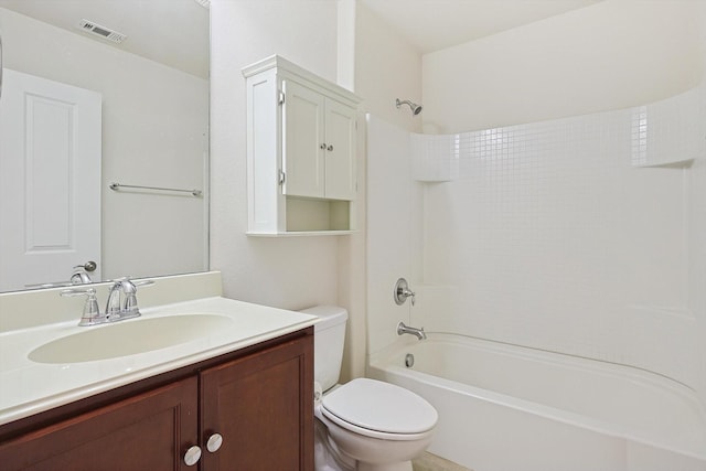 full bathroom featuring vanity, shower / bathtub combination, and toilet