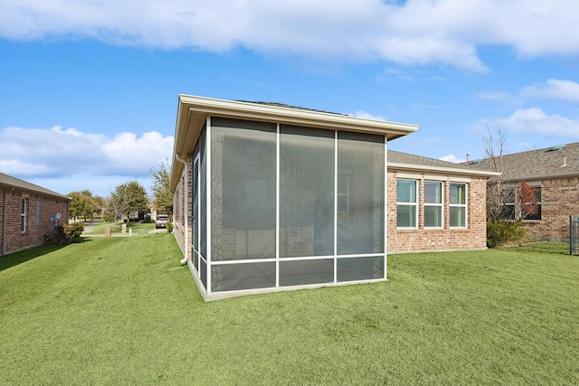 view of home's exterior featuring a yard