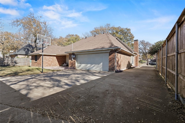 view of side of property featuring a garage