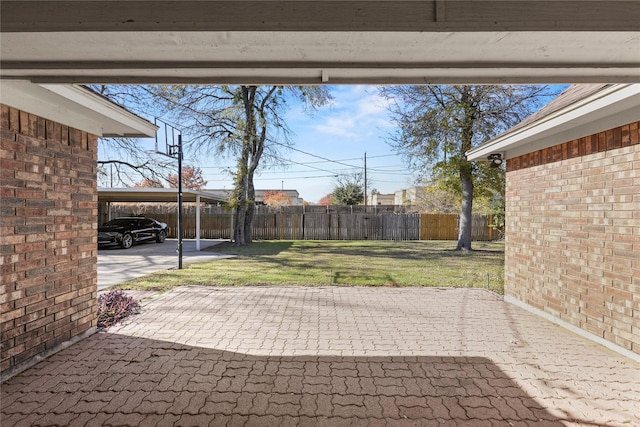 view of patio featuring a carport