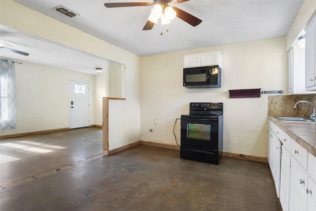 kitchen with white cabinetry, sink, ceiling fan, tile countertops, and black appliances