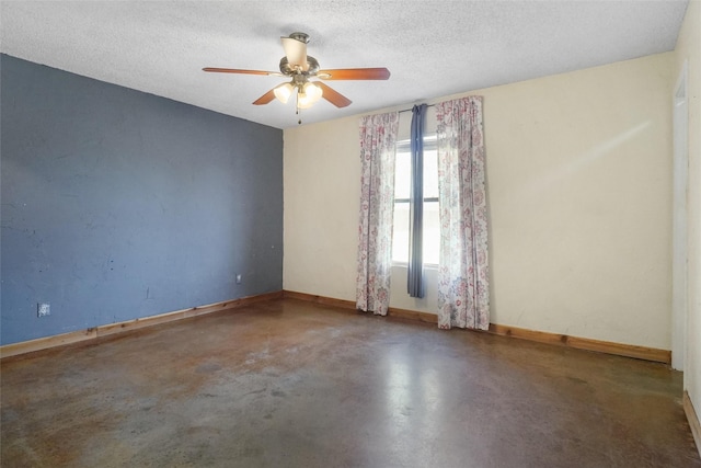 unfurnished room with a textured ceiling, concrete floors, and ceiling fan