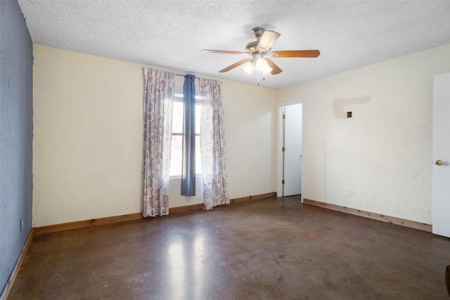 unfurnished room with a textured ceiling and ceiling fan