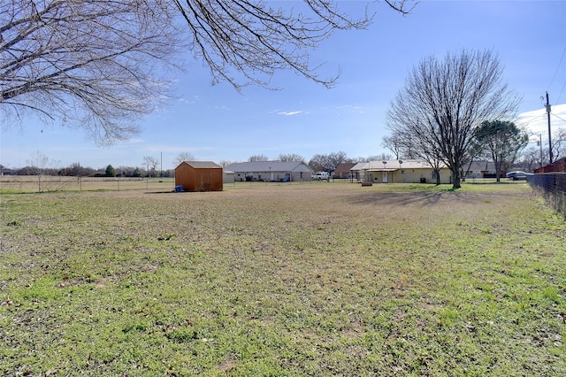 view of yard featuring a storage shed