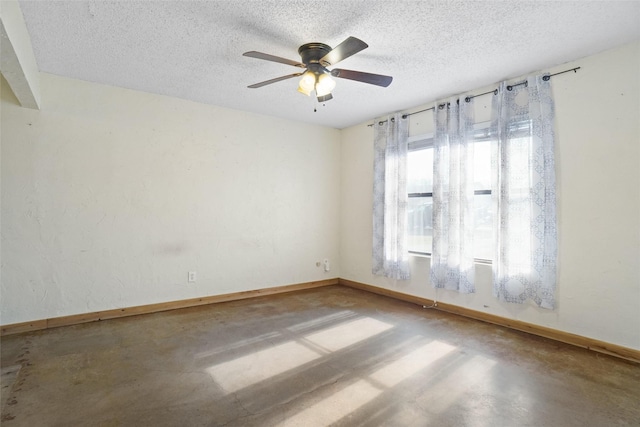 unfurnished room featuring ceiling fan, a textured ceiling, and concrete floors