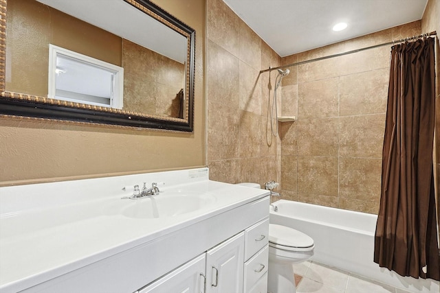 full bathroom with tile patterned floors, shower / bath combo, toilet, and vanity