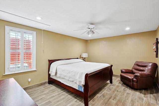 bedroom featuring light wood-type flooring and ceiling fan