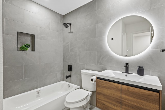 full bathroom featuring tub / shower combination, toilet, decorative backsplash, vanity, and tile walls