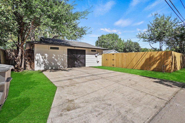 garage with a yard