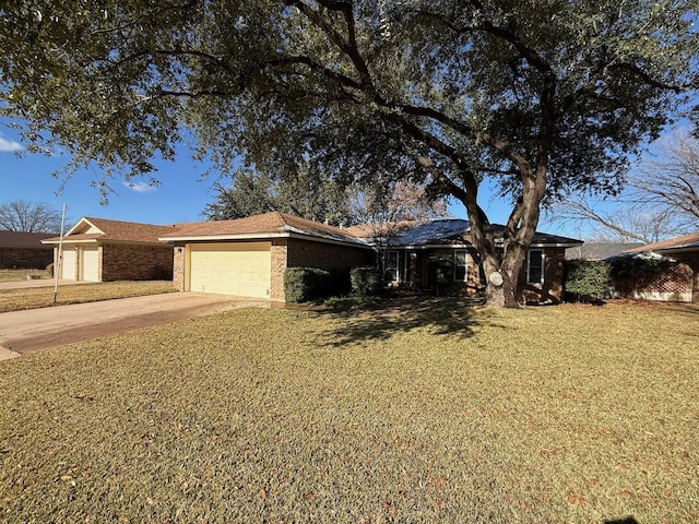 ranch-style home featuring a garage