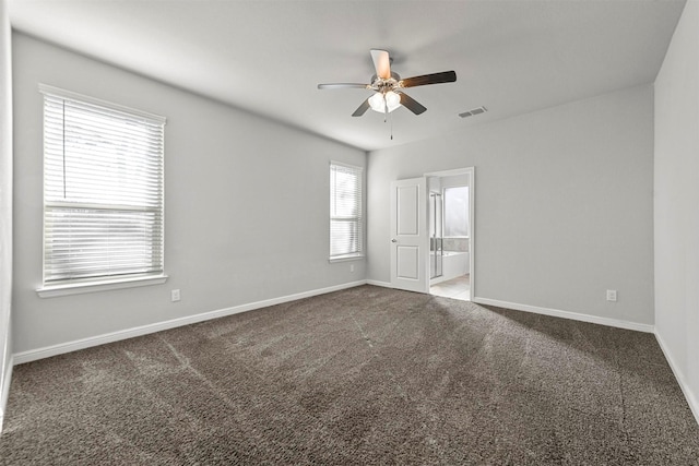 carpeted empty room with ceiling fan