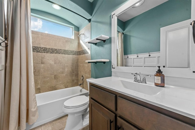 full bathroom with tile patterned flooring, shower / bath combo, vanity, and toilet