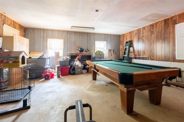 playroom featuring concrete floors and billiards