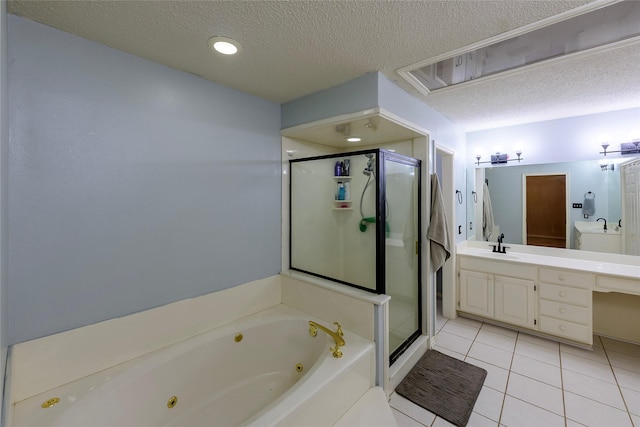 bathroom featuring tile patterned floors, vanity, a textured ceiling, and independent shower and bath