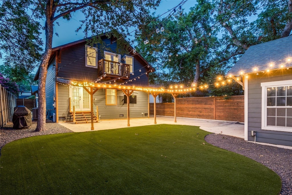 5316 Richard Ave, Dallas, TX 75206 - rear view of property featuring a patio, a balcony, and a lawn