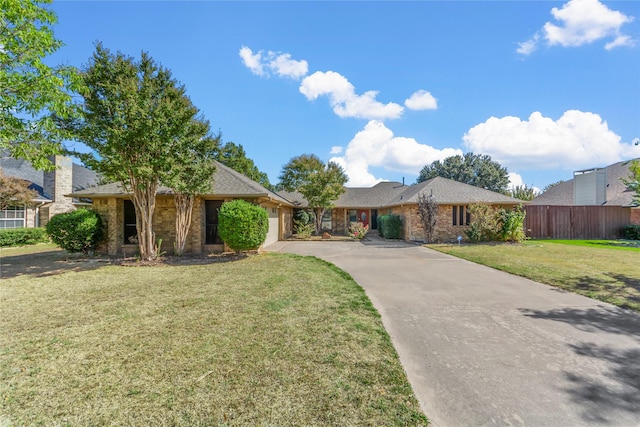 ranch-style house with a front lawn