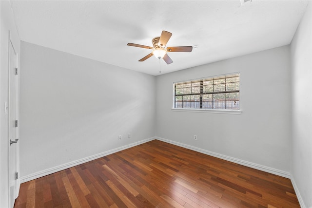 unfurnished room with hardwood / wood-style floors and ceiling fan