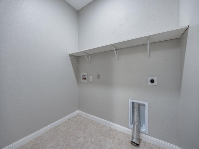 washroom with hookup for an electric dryer and washer hookup