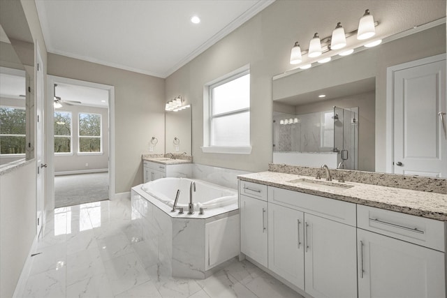 bathroom with ceiling fan, vanity, ornamental molding, and shower with separate bathtub