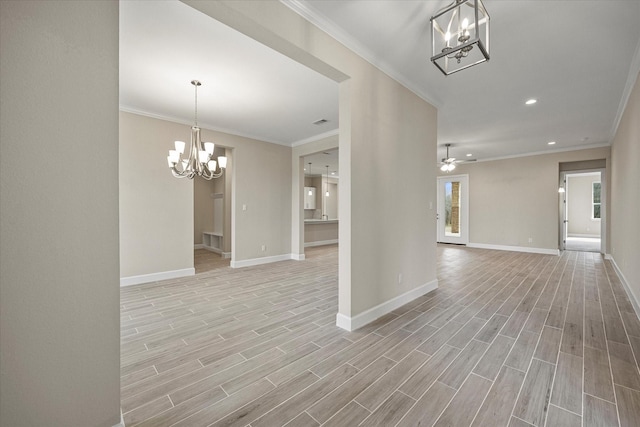 interior space with crown molding, ceiling fan with notable chandelier, and light hardwood / wood-style floors